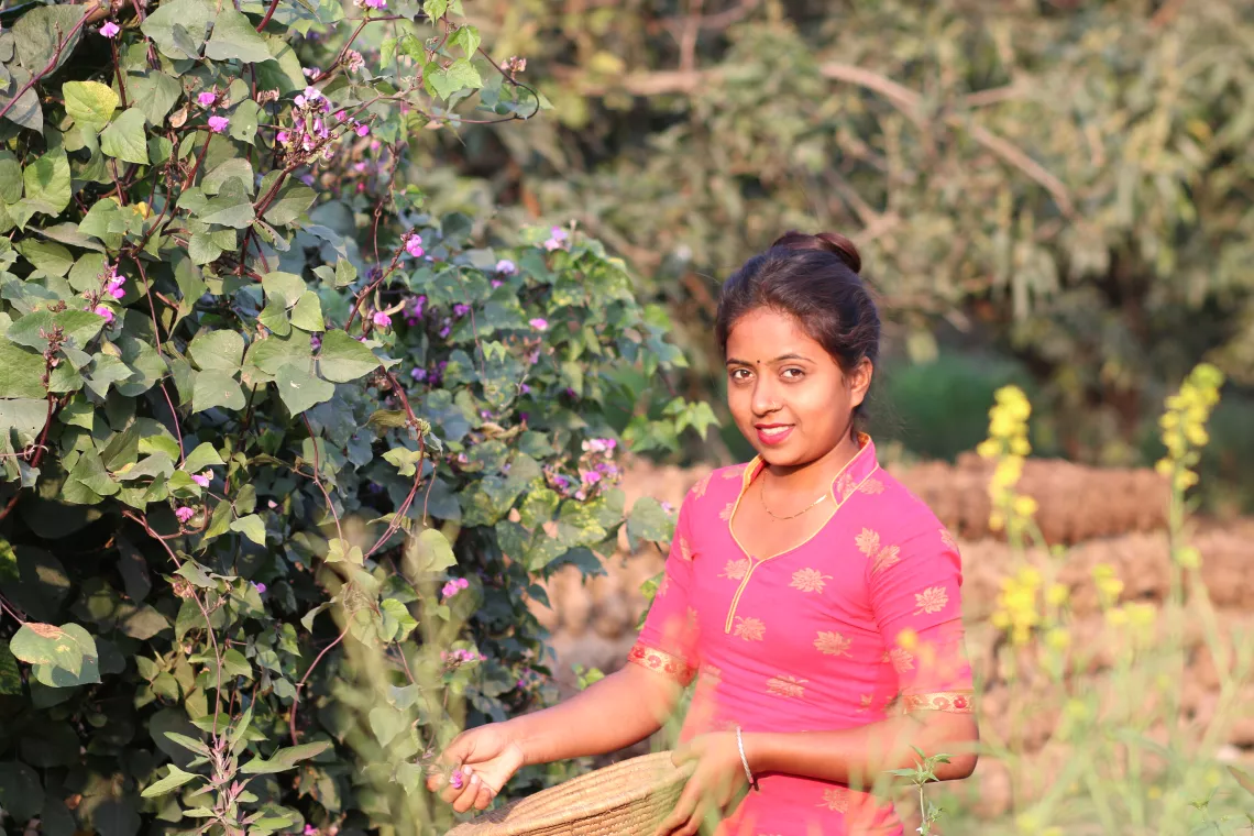 This image shows Mantoriya Mahara in the garden of her home in Mithila Municipality in Dhanusha District