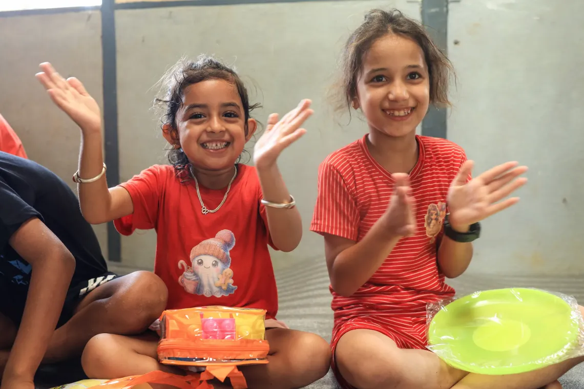 Children playing in the newly set up child friendly space 