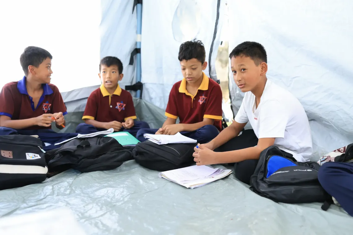 On 22 September 2026, Susin and his friends return to learning at a UNICEF-supported temporary learning centre at Tribhuvan Trishuli Secondary School in Nuwakot, Nepal.