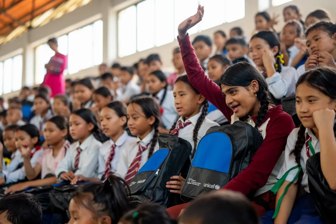 On 22 September 2026, students at Tribhuvan Trishuli Secondary School receive UNICEF-supported school bags and essential learning materials in Nuwakot, Nepal. 