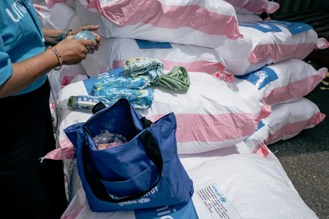 UNICEF staff load pre-positioned hygiene kits at the Humanitarian Staging Area in Kathmandu for delivery to flood-affected communities in Rasuwa, Nuwakot and Dhading Districts to support children and families affected by the devastating floods, helping meet immediate hygiene and sanitation needs during the emergency.