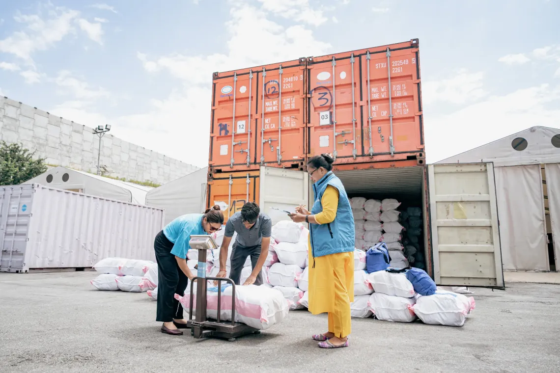 UNICEF staff load pre-positioned hygiene kits at the Humanitarian Staging Area in Kathmandu for delivery to flood-affected communities in Rasuwa, Nuwakot and Dhading Districts to support children and families affected by the devastating floods, helping meet immediate hygiene and sanitation needs during the emergency.