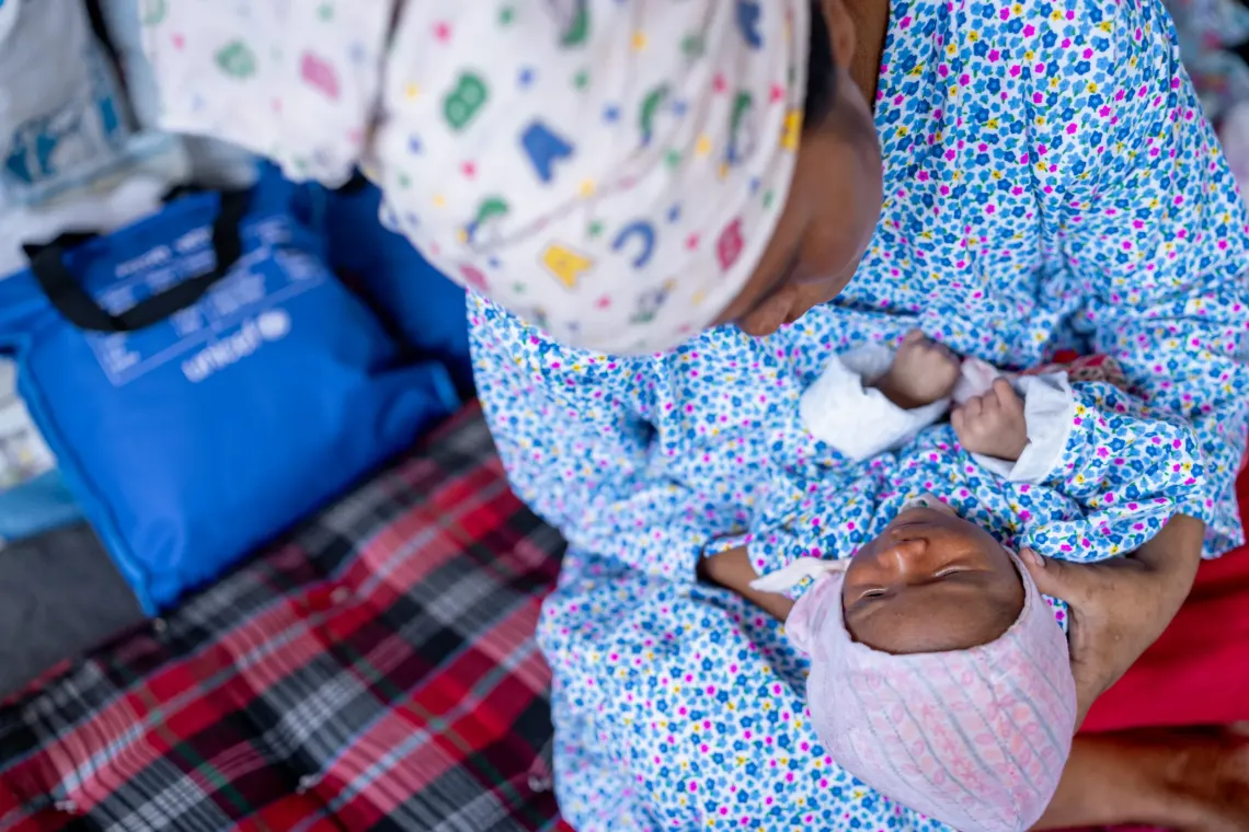 On 4 September 2026, Nanu Maya receives a newborn kit provided with UNICEF support during a postnatal care (PNC) visit at a holding centre in Bidur Municipality, Nuwakot, Bagmati Province, Nepal.