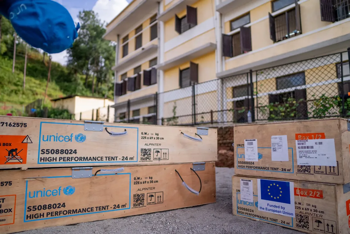 On 14 September 2026, wooden crates containing UNICEF-supported tents for temporary learning centres are at Chandra Jyoti Secondary School in Bidur Municipality, Nuwakot District, Nepal,