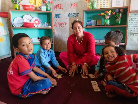 With laughter, learning, and excitement, Basanta guides her students through a playful, hands-on activity.