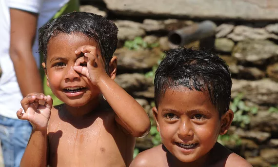 two children taking a bath