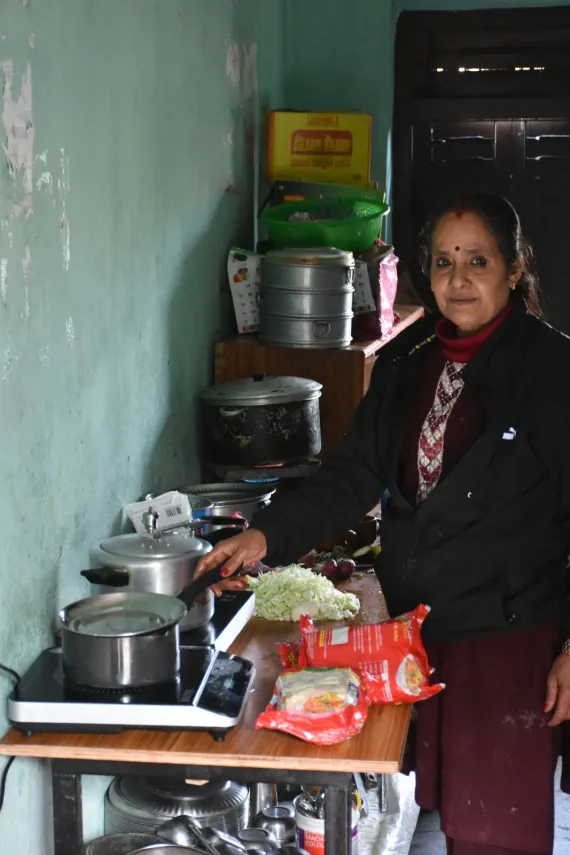 Miss Shanti, the school cook, shared that her health has improved since shifting away from traditional wood stoves and burners that cause constant stress on her respiratory system from fume inhalation.