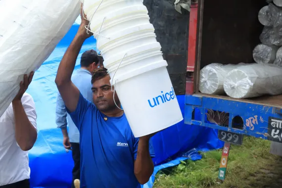 Trucks loaded with essential humanitarian supplies head to flood-affected areas.
