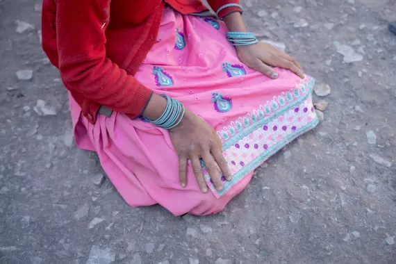 a view of hands on a lap