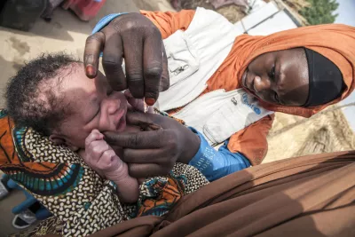 A child receives the polio vaccine