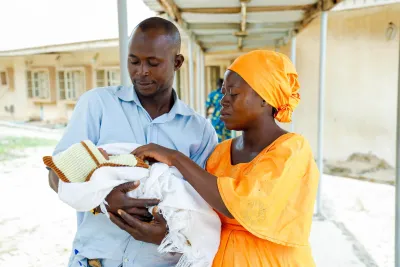 Taofikat Ismaila (Mother), Ismaila Abdulazeez (Father) and their daughter Rahamat (10-days old)