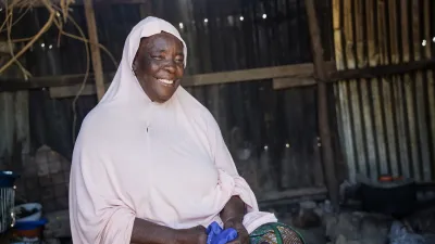 A woman smiling at a camera