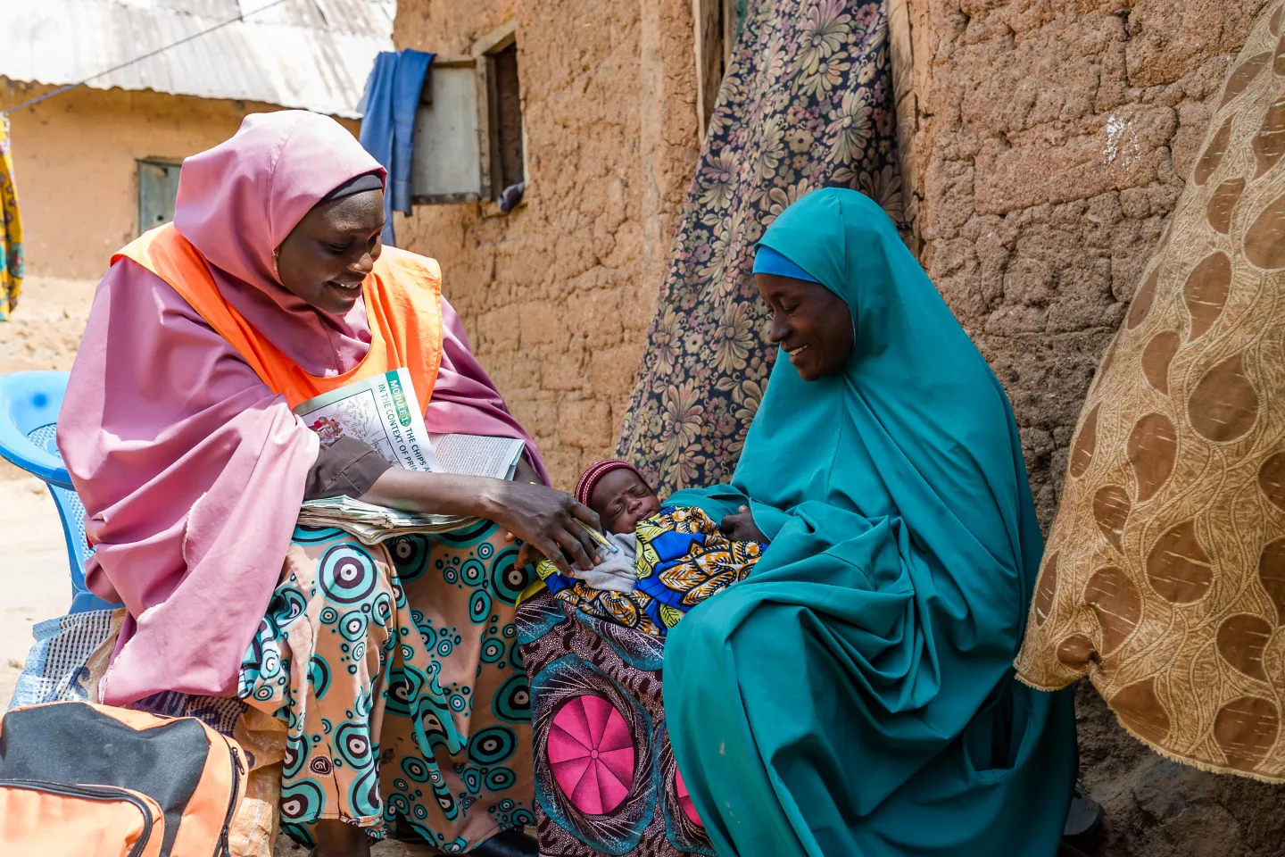 A health worker attending to a patient