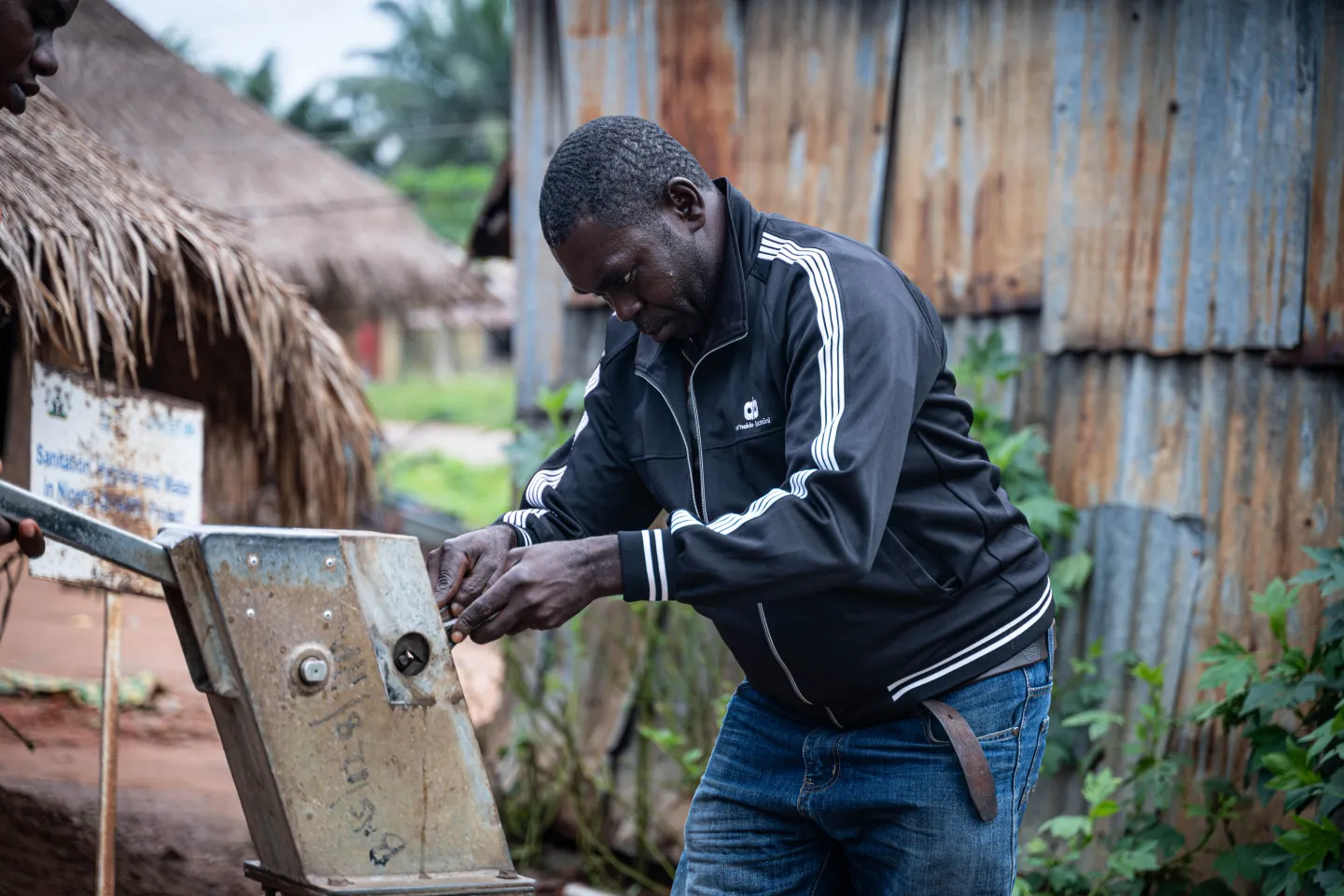 A local area mechanic working on a borehole 
