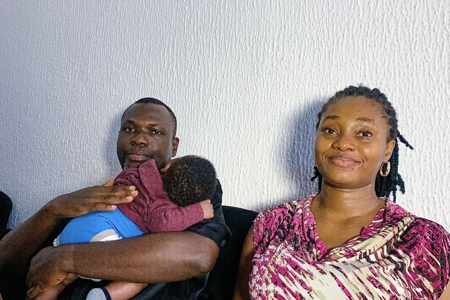 A couple with their baby