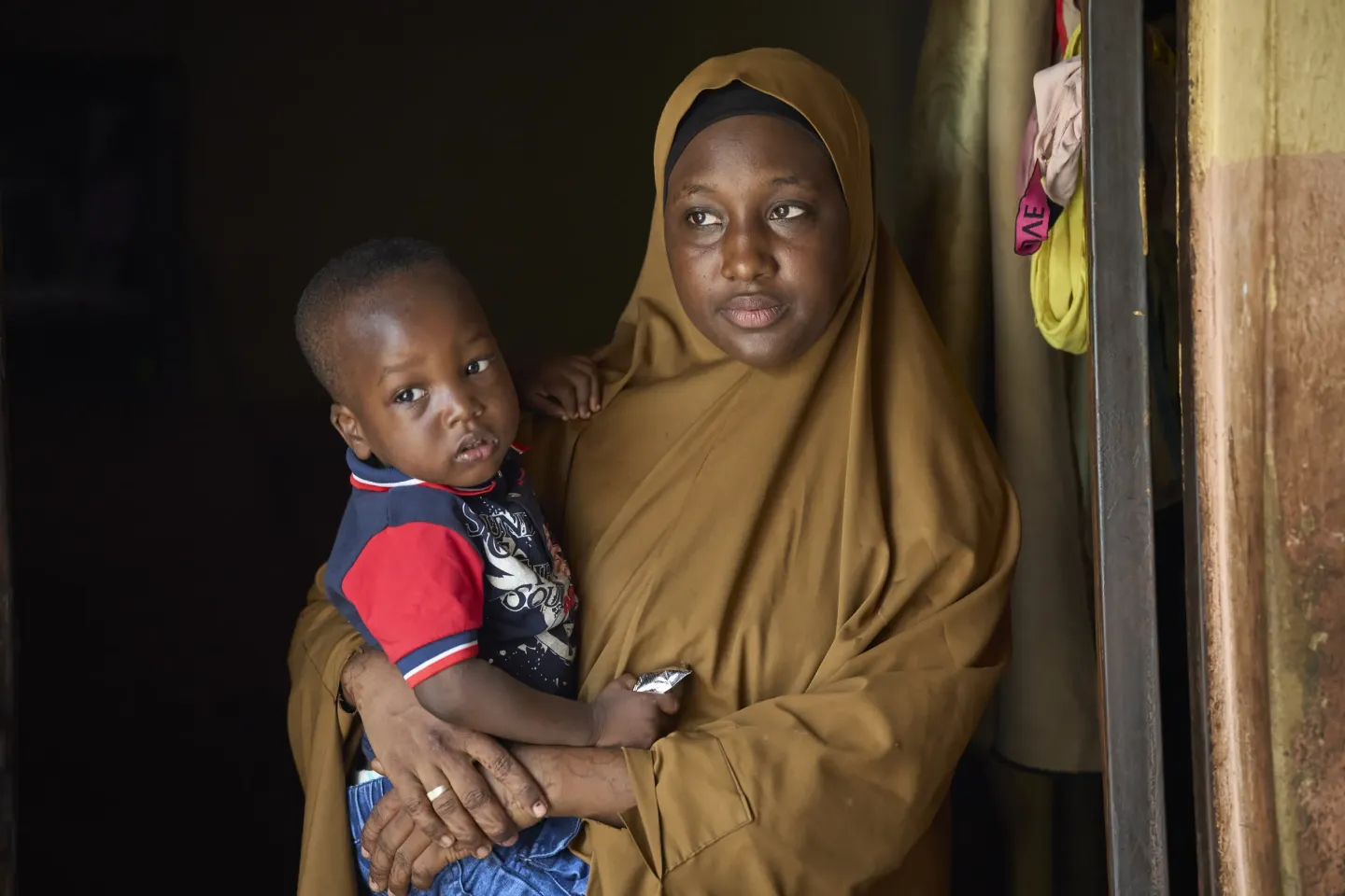 A mother holding her baby