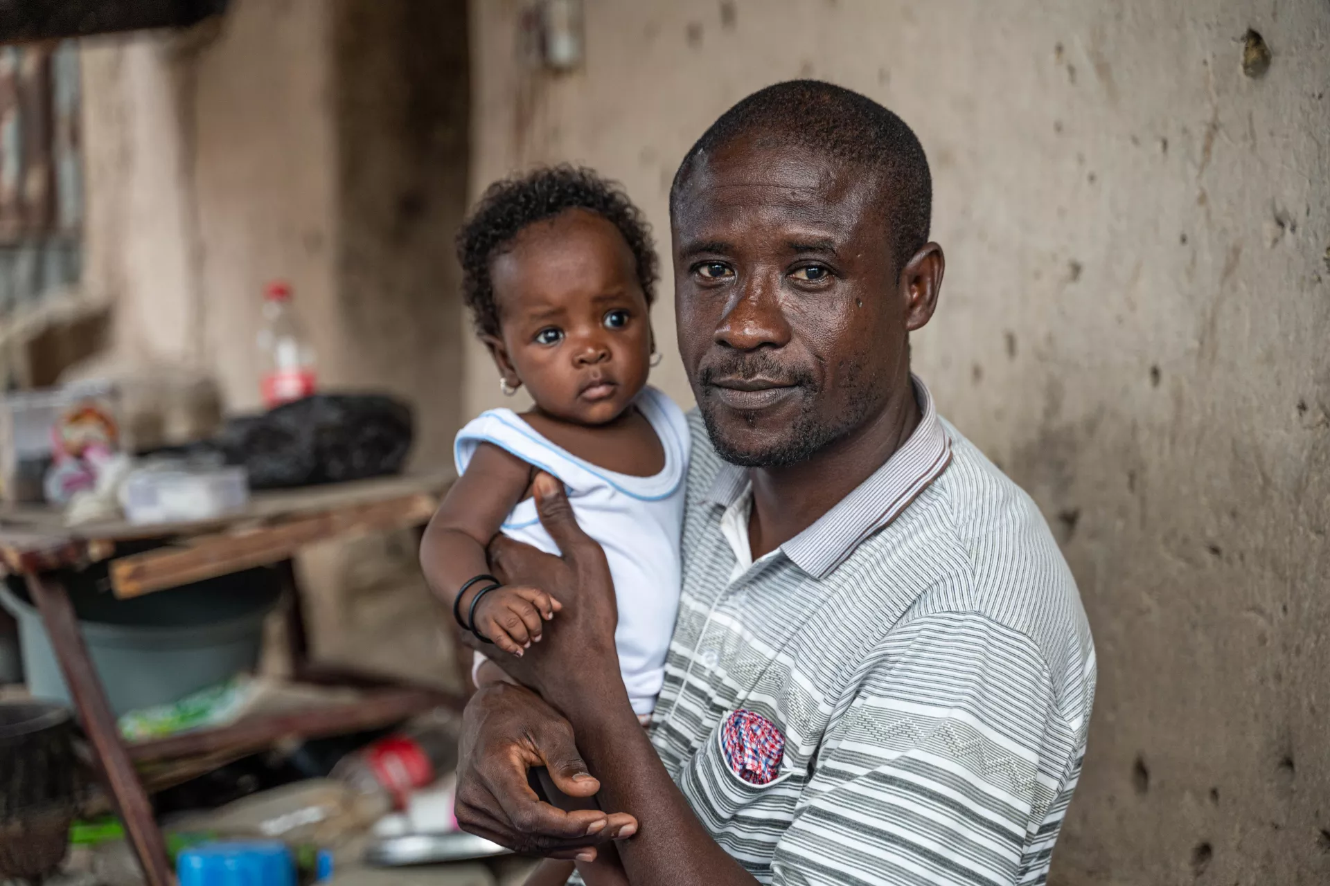 A father carrying his daughter 