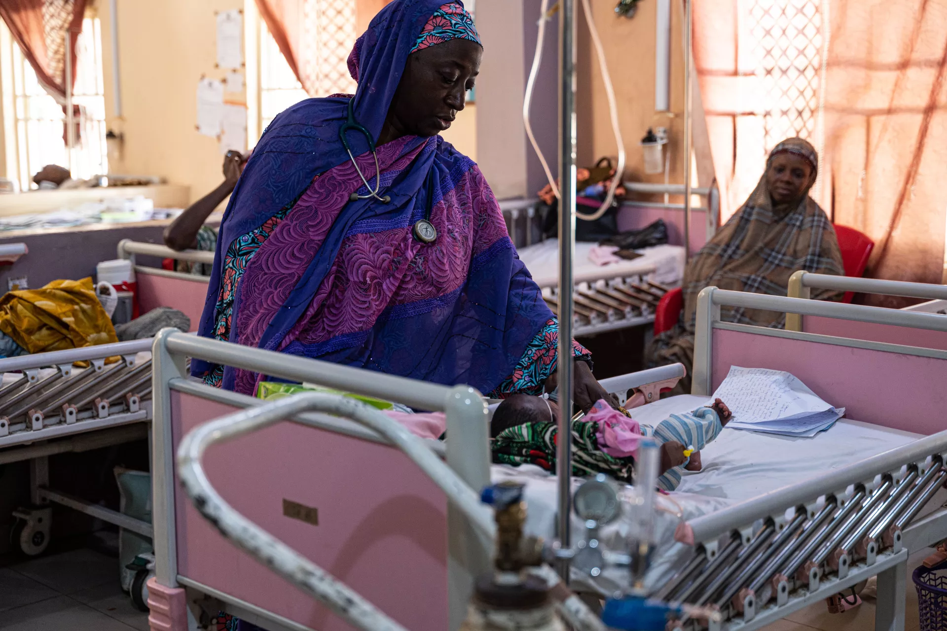 A doctor examining a patient