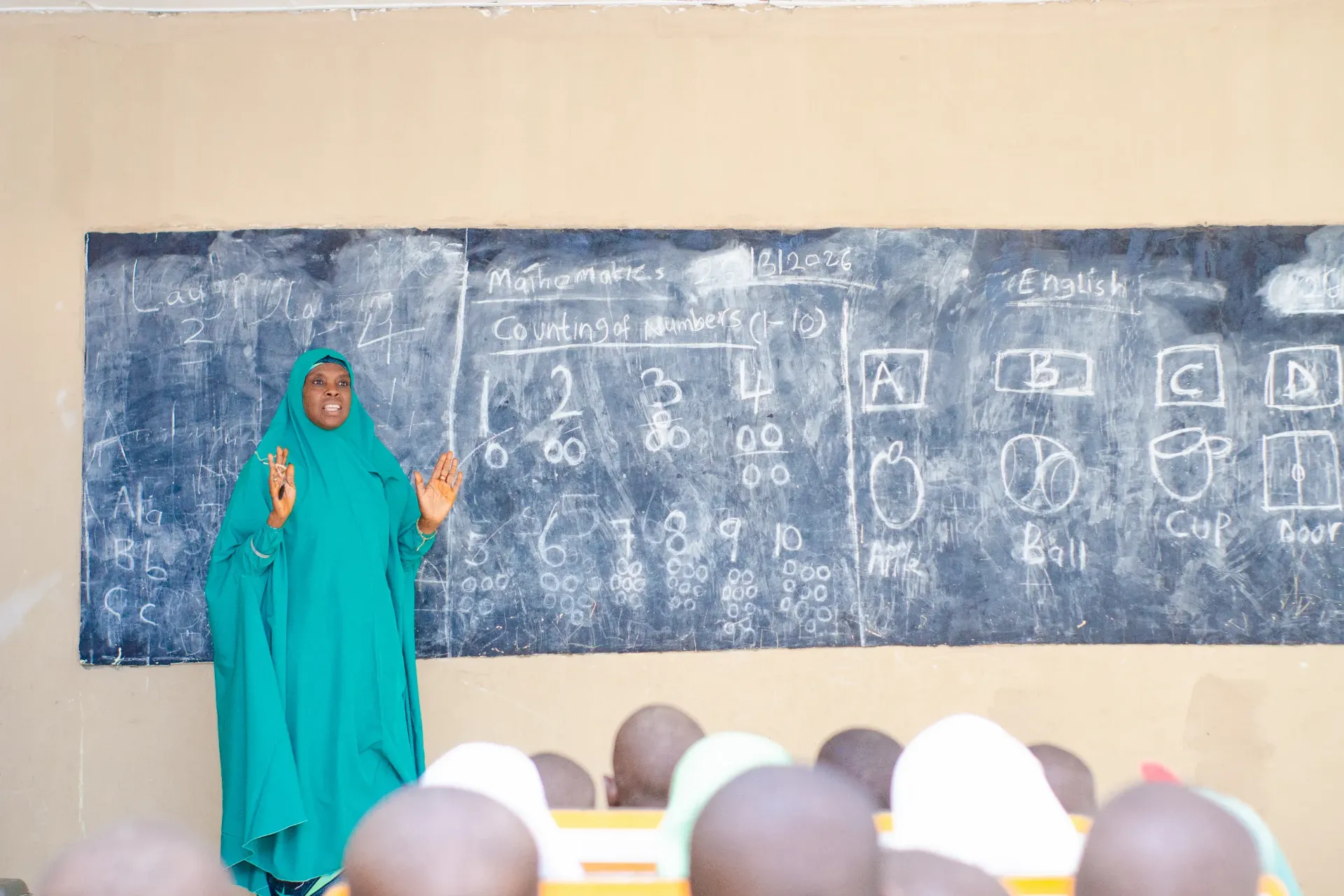 A teacher in front of a classroom