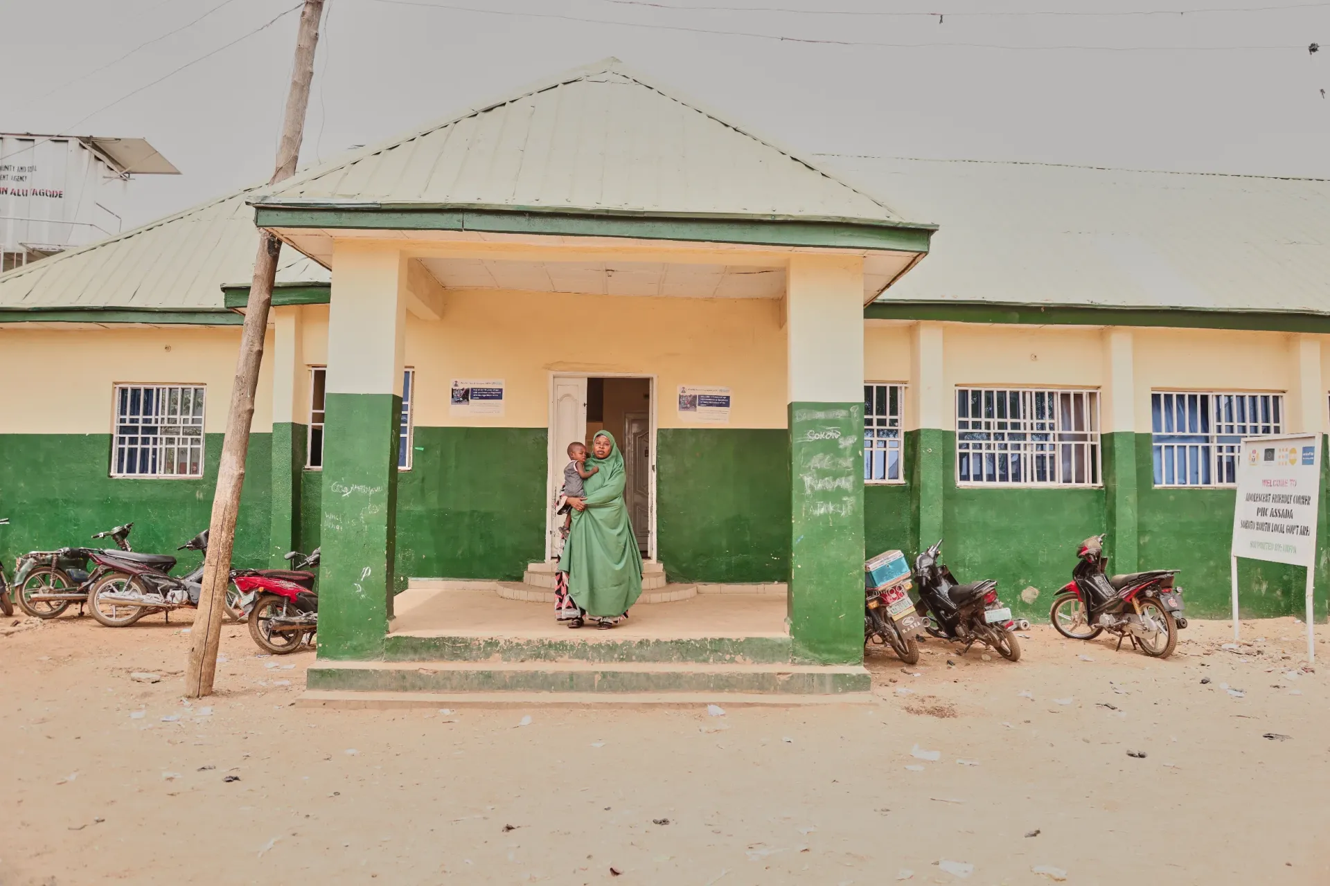 A mother with her babies at the health centre