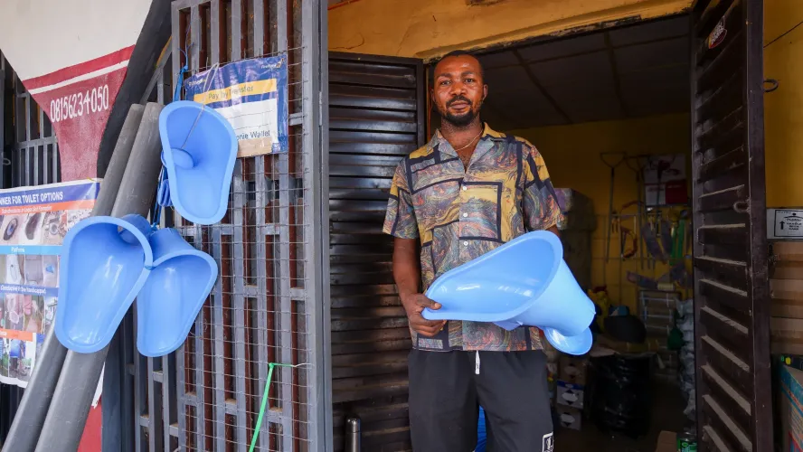 A toilet business owner in his shop