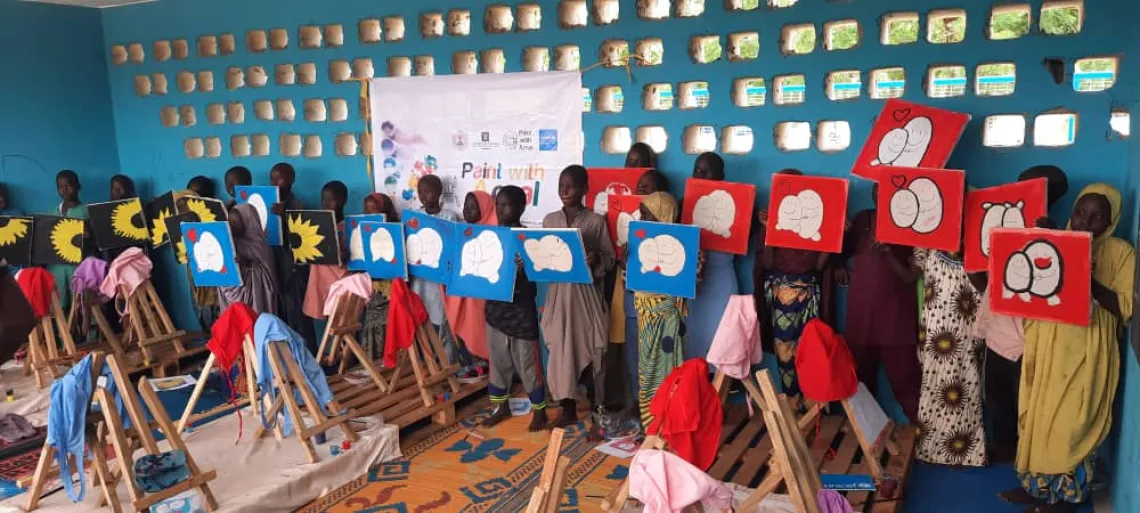 A group of children painting