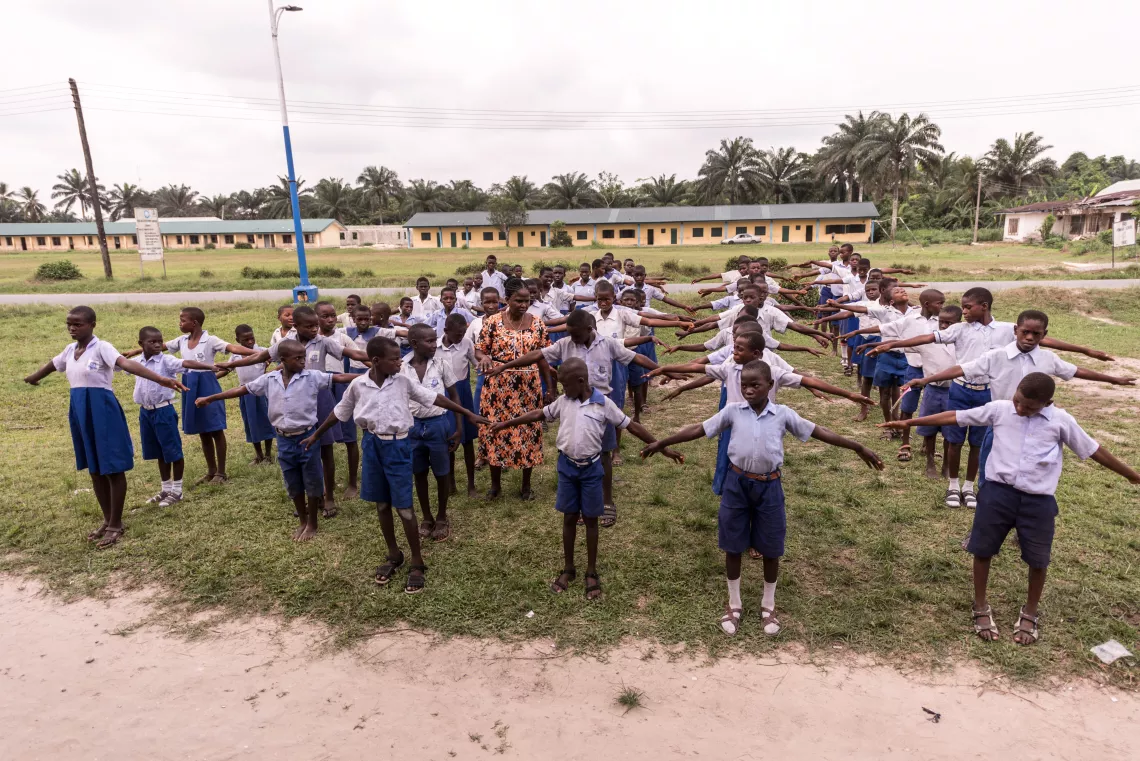 Schoolchildren preparing for a hygiene and sanitation exercise