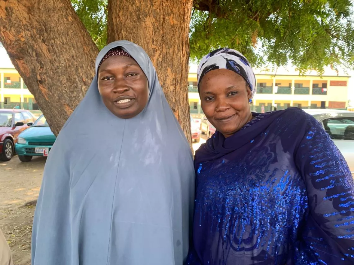 Two women smiling