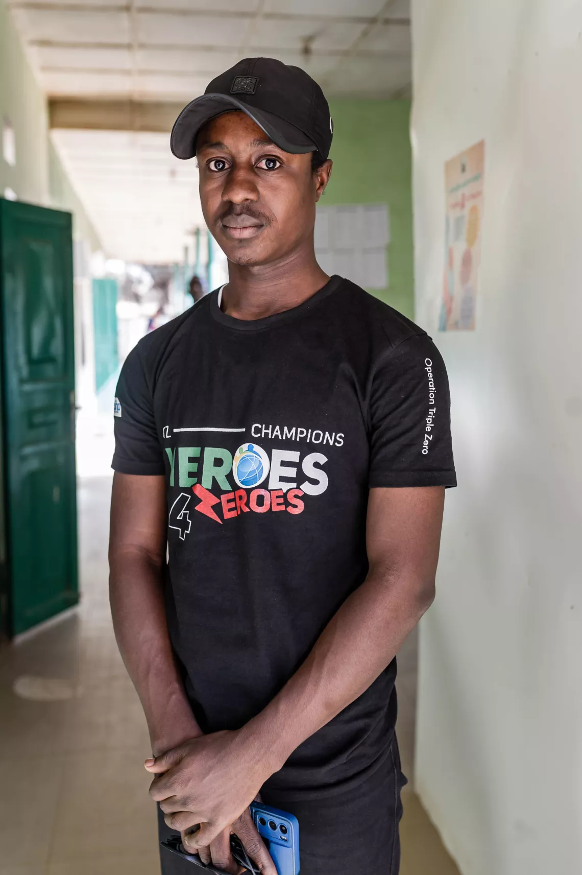 A young man standing