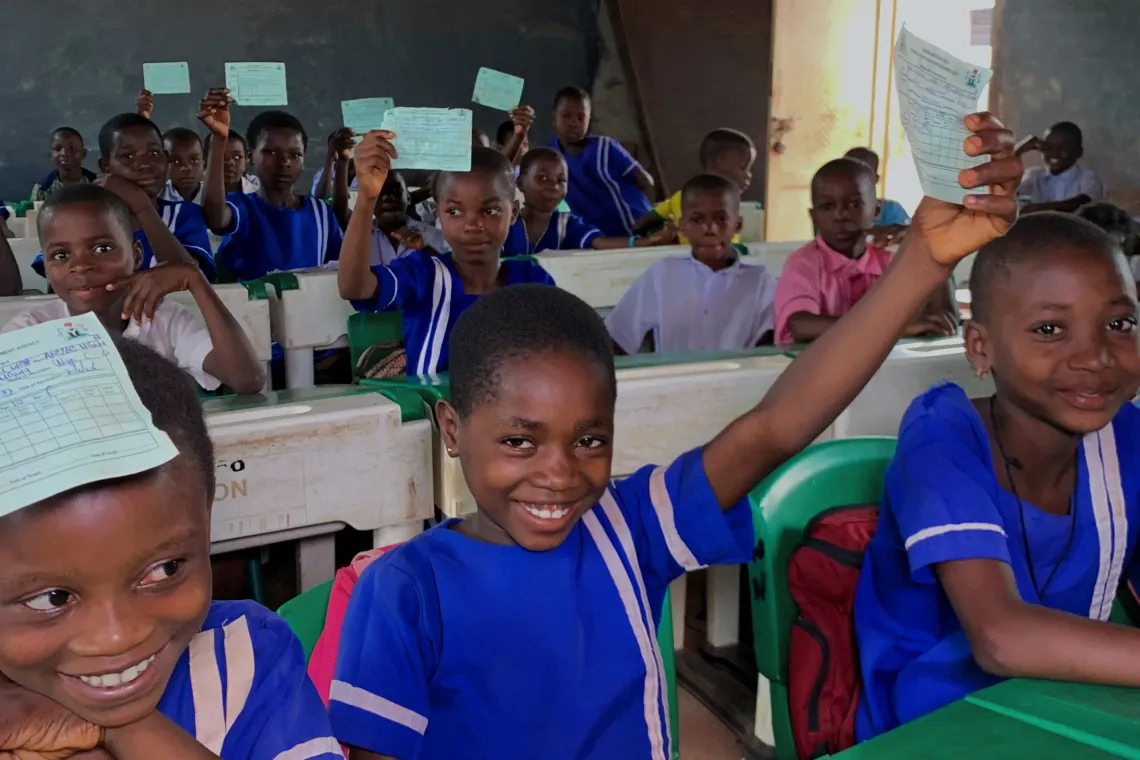 Students with their immunization cards