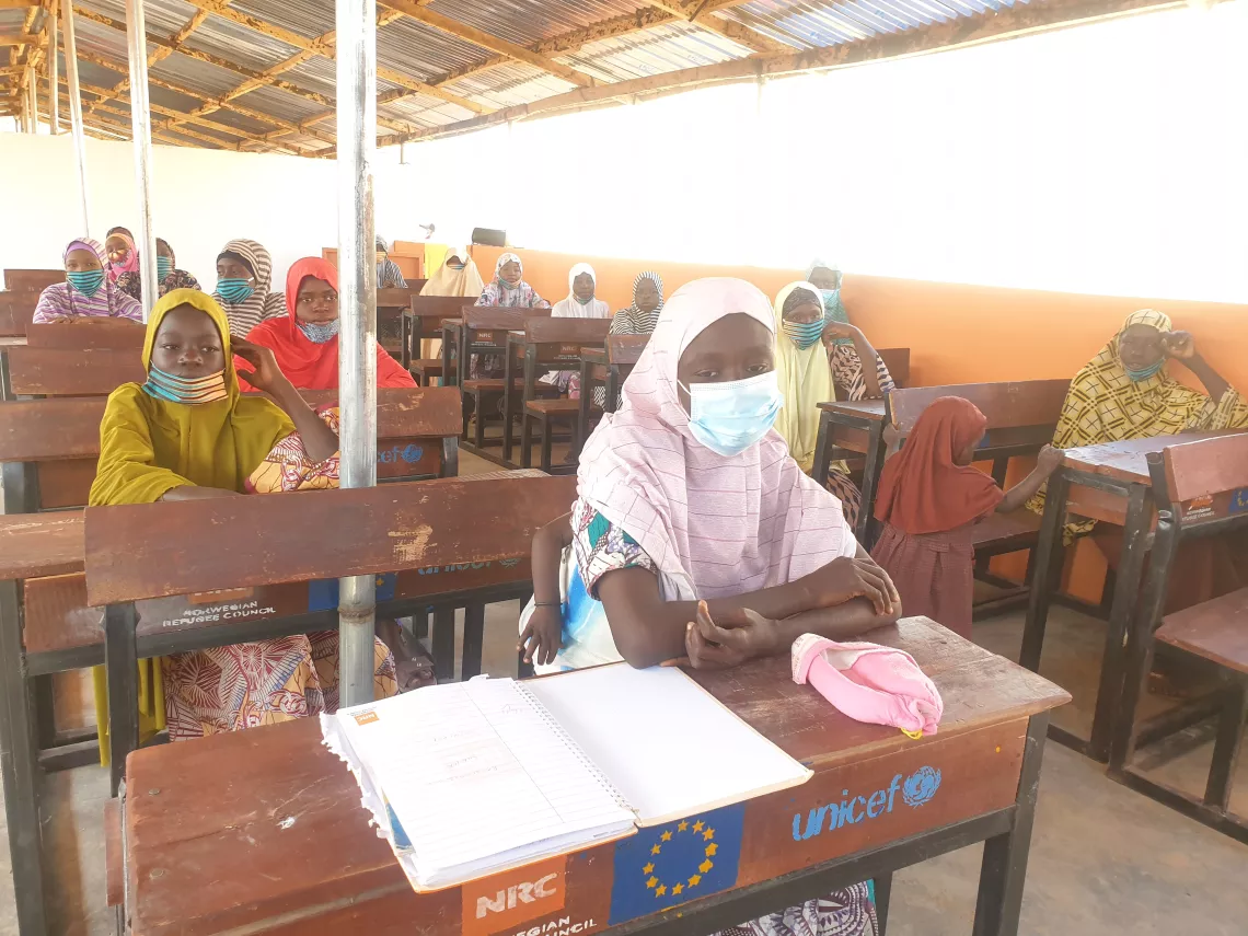 Students sitting in a classroom 