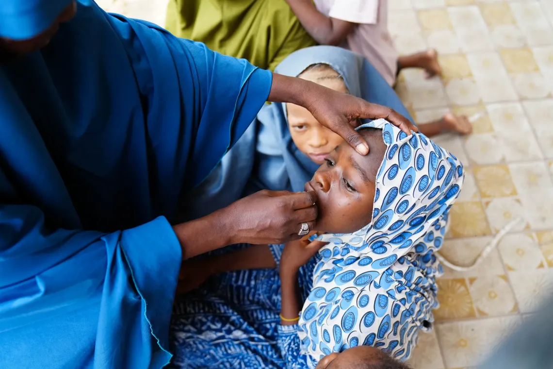 A girl getting vaccinated