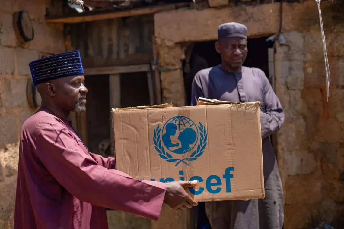 Families affected by cholera outbreak in Plateau State receive cholera kits for improved household hygiene.
