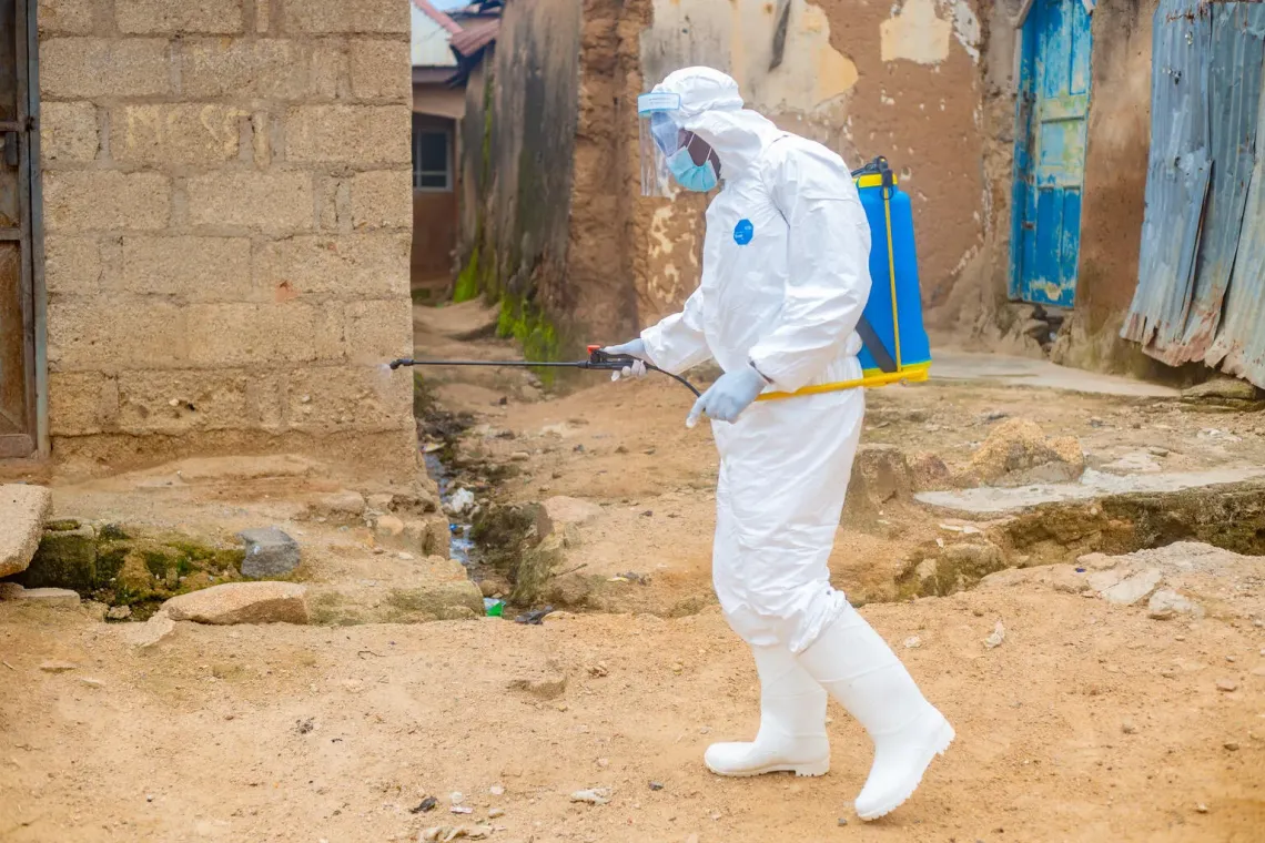 With support from UNICEF, Isa Mohammed, WASH Surveillance official leads the fumigation of affected communities during cholera outbreak response.