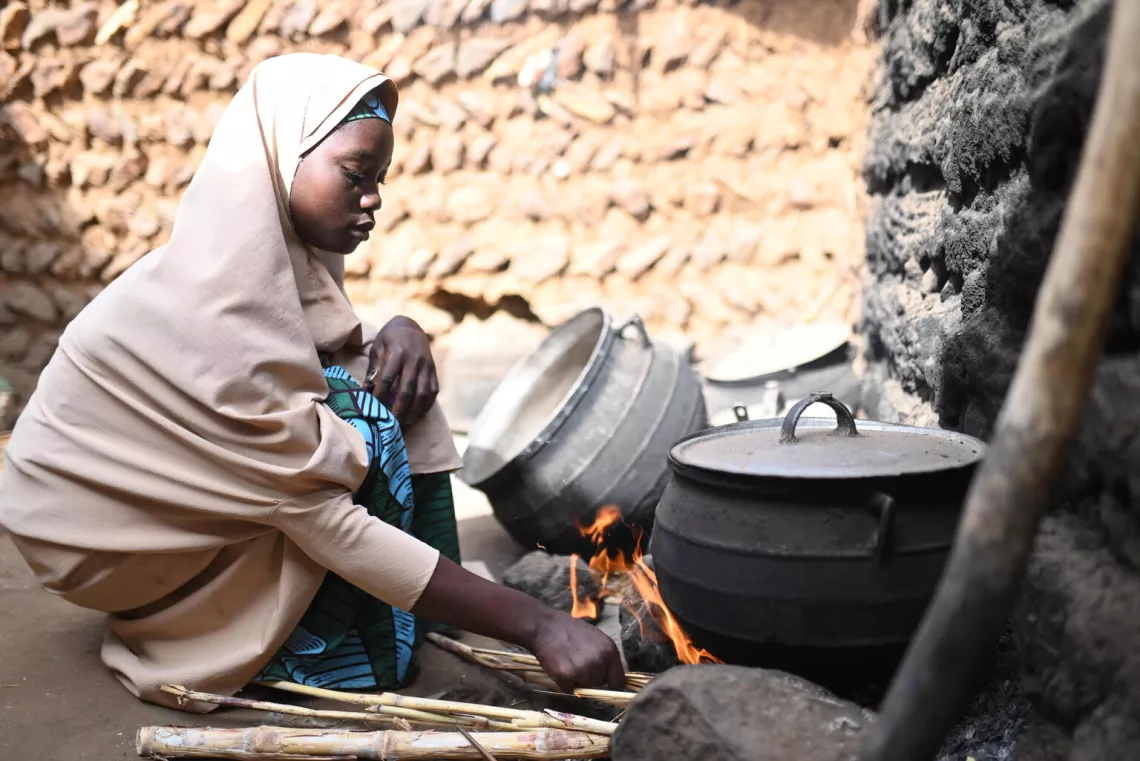 Fadminatu Shehu making Kunu in her home in Kindiru community Dange Shuni, Sokoto State