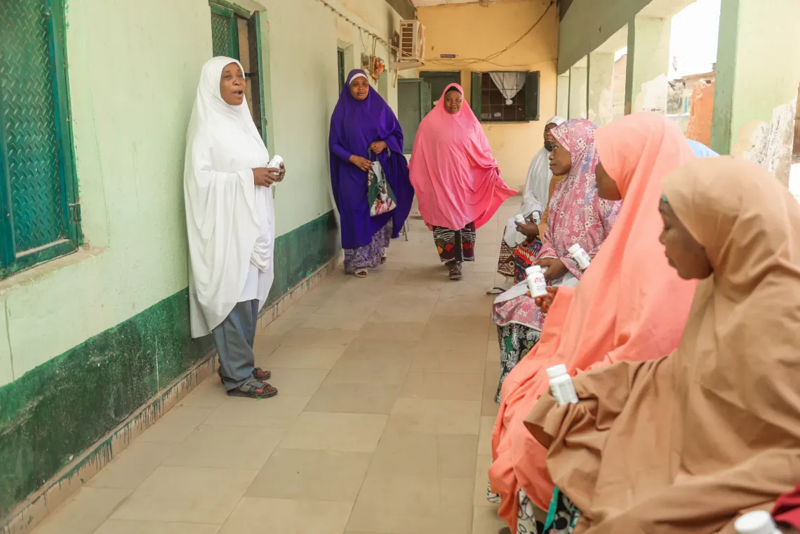 A mother with her babies at the health centre