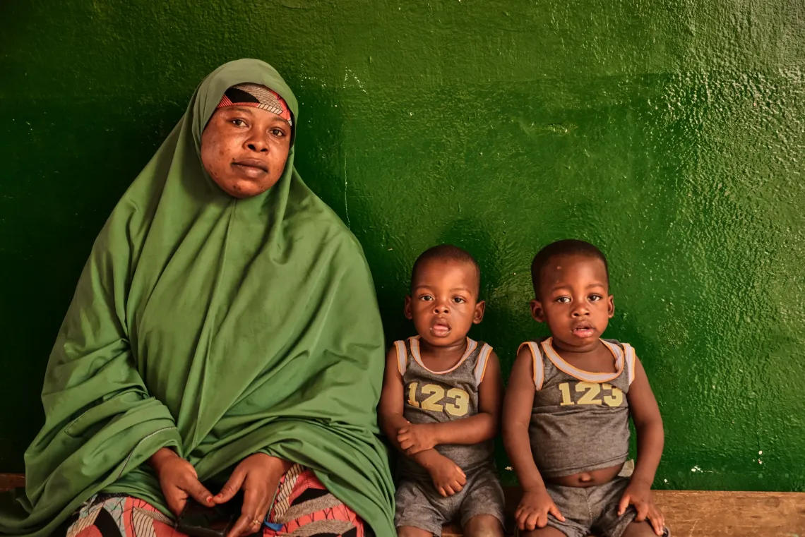 A mother with her babies at the health centre