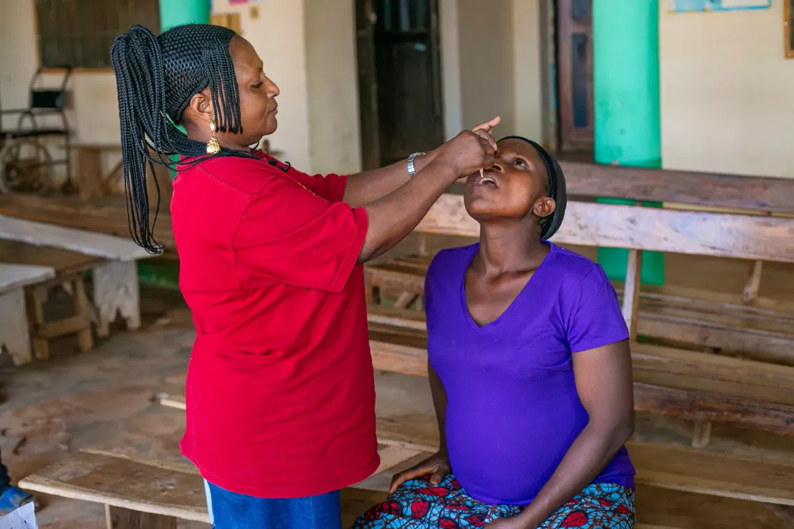 A pregnant woman receiving vaccine