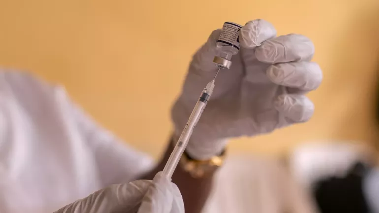vaccine and syringe