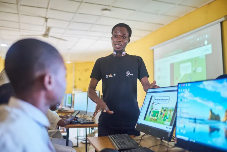 A teacher teaching pupils.