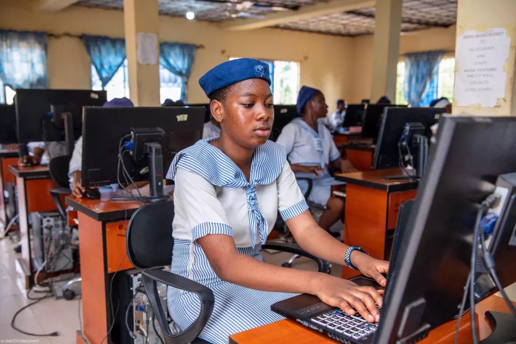 A girl in a digital learning class using the Nigeria Learning Passport at Government Senior College Agege, Lagos.