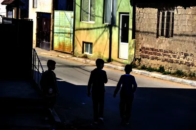 Three boys walking. 