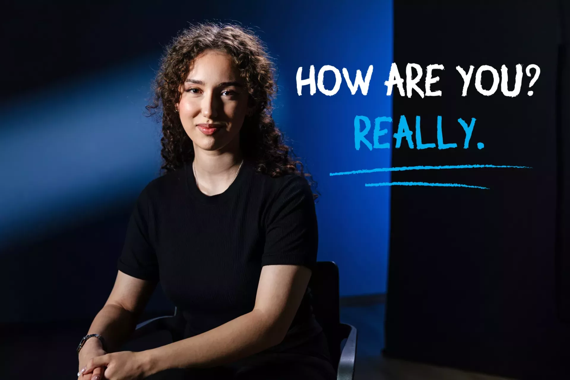 Photo of adolescent girl smiling and looking at the camera with the text How are you? Really.