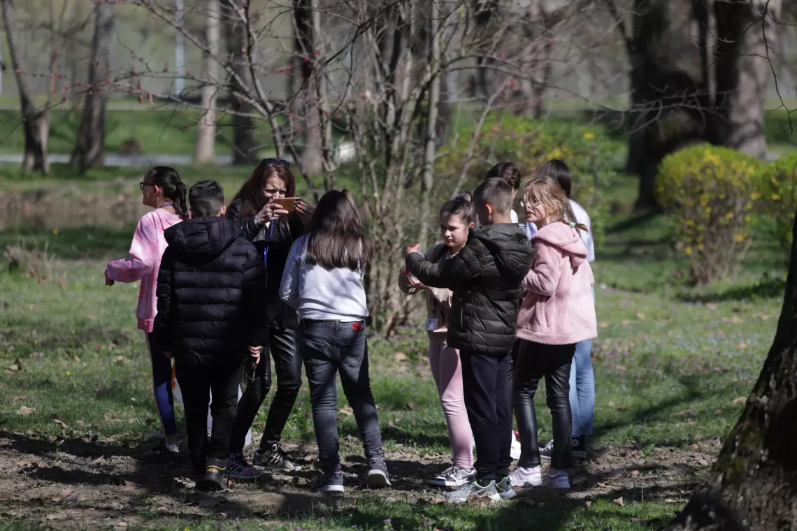 Group of children exploring in the park as part of a experiential learning workshop organized within the Climate Action event