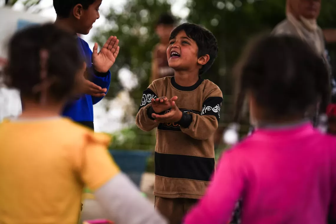 Children play in Debaga, Iraq.