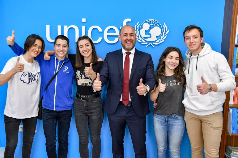 UNICEF representative Benjamin Perks along with the five members of the Andrometa team showing thumbs up after realizing that Andrometa is one of the global winners of the Generation Unlimited challenge.