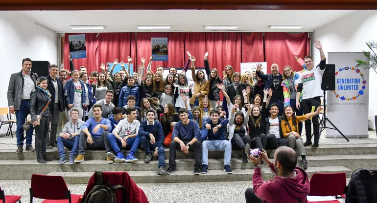 Group photo of the five teams people who developed creative solutions to end violence against and among children as part of #Generation Unlimited