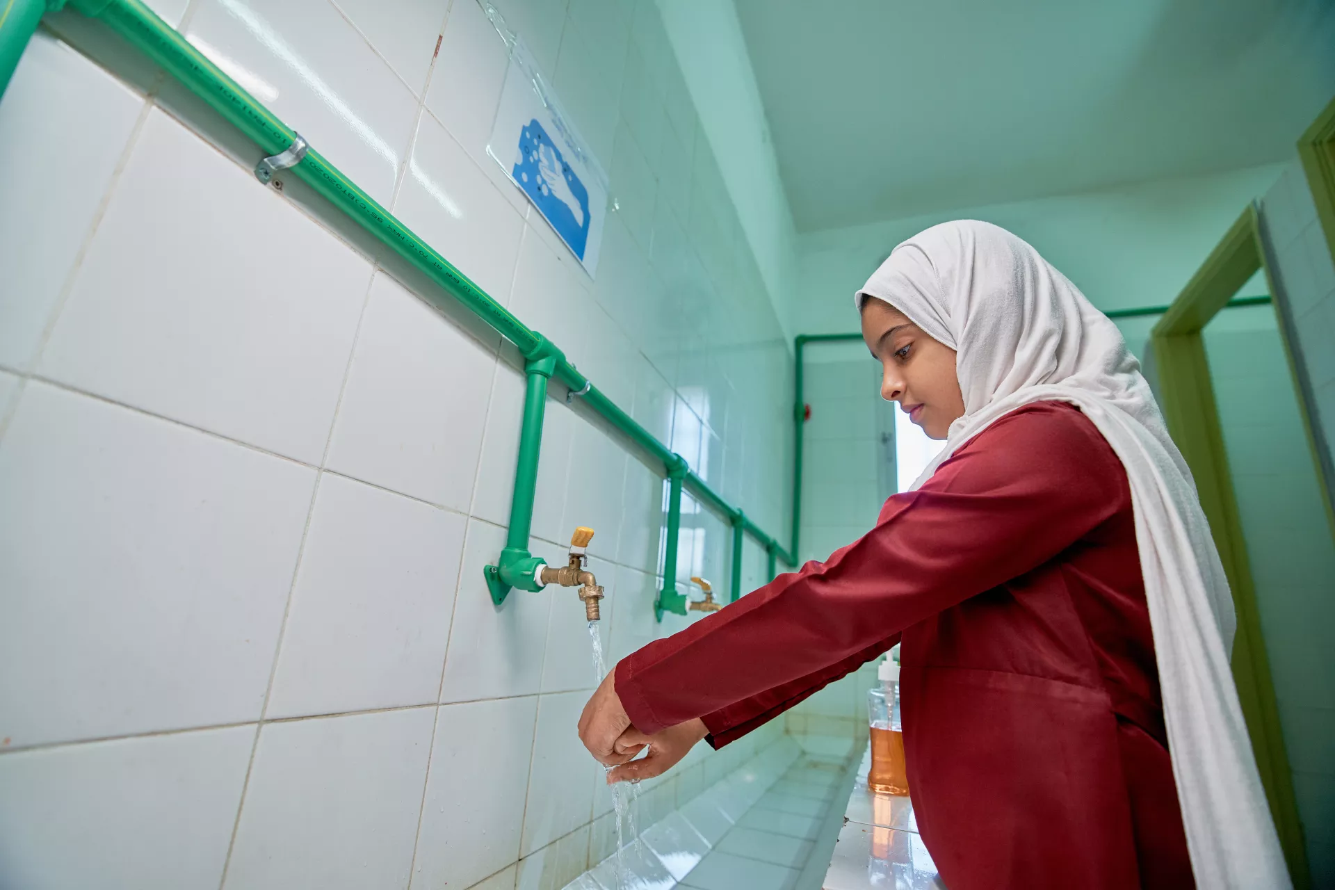 Girl washing hands 