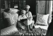 Father reading to his son