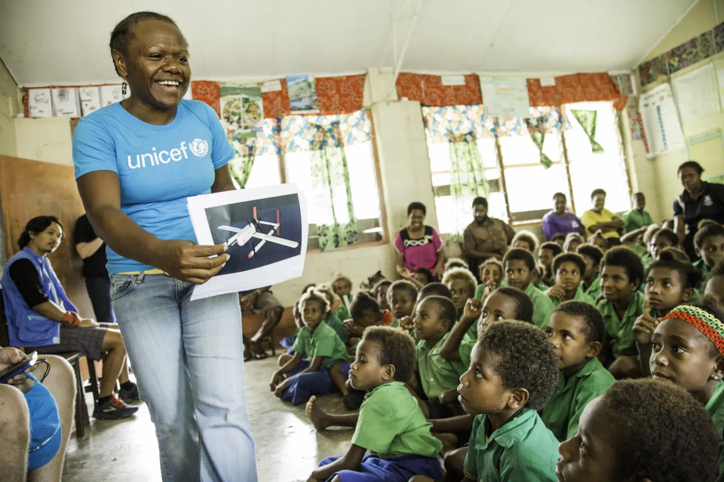 UNICEF volunteer in a classroom.